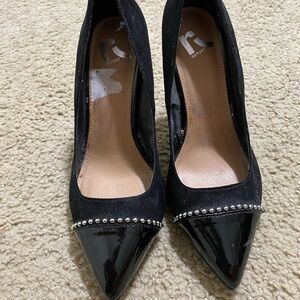 Brand new - never worn black heels with silver details